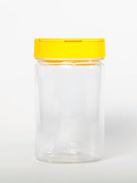 istock Cans for storing bulk products with yellow lids on white isolated background 1308146726