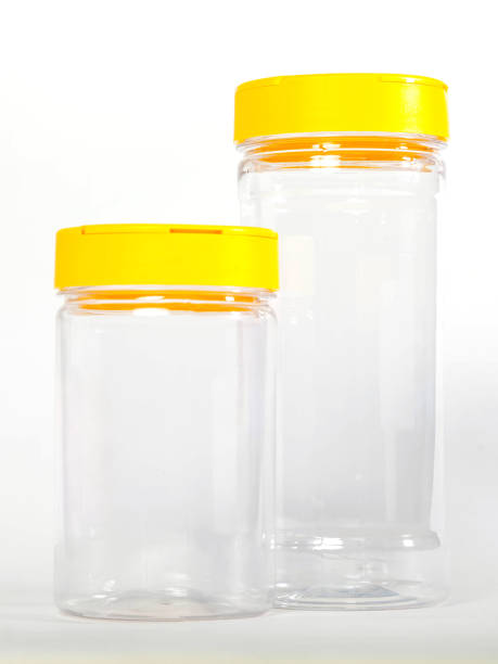 istock Cans for storing bulk products with yellow lids on white isolated background 1308146747