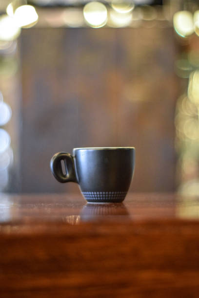 istock Cup of coffee cappuccino on wooden table 1308159199