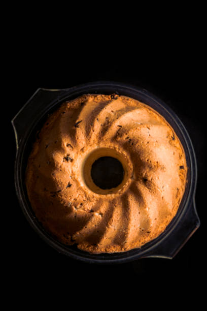 Fresh homemade Gugelhupf, ring cake and baking mold