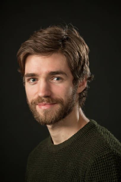 istock Studio portrait of a 25 year old bearded man 1308162278