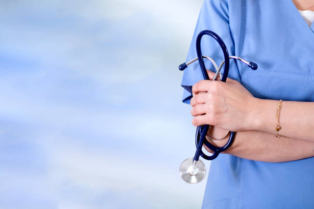 istock doctor holding stethoscope 1308164001
