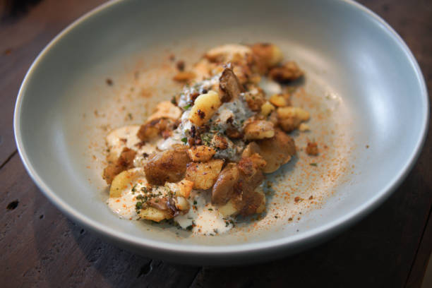 istock baked roasted potatoes with sour cream and herb 1308168903