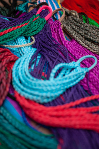 istock Colored braids on an elastic band for hair 1308168996