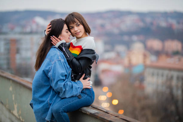 istock Lgbt girls enjoys on rooftop 1308170799