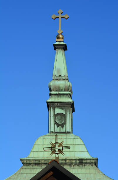 istock church top with a cross 1308173103