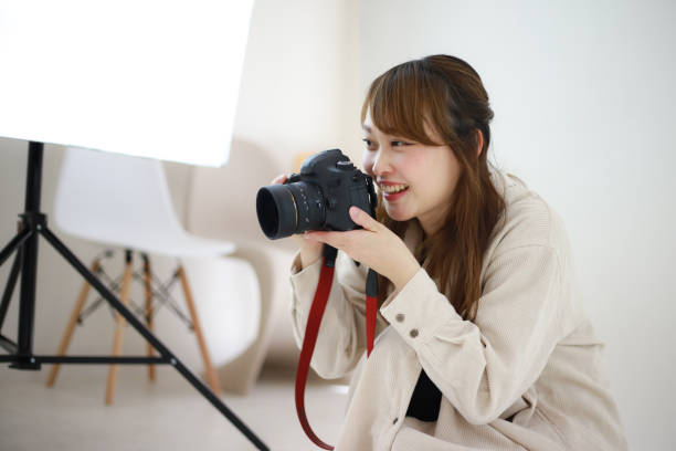 istock Smile female photographer 1308177284
