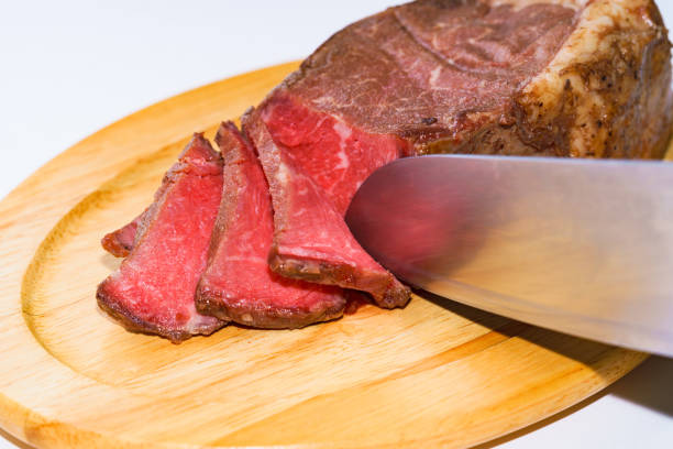 Roast beef on the wooden dish