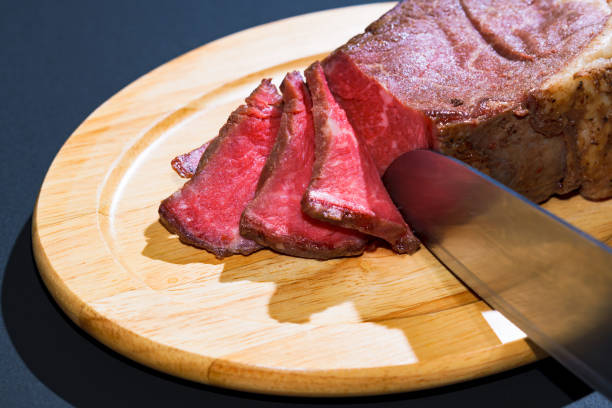 Roast beef on the wooden dish