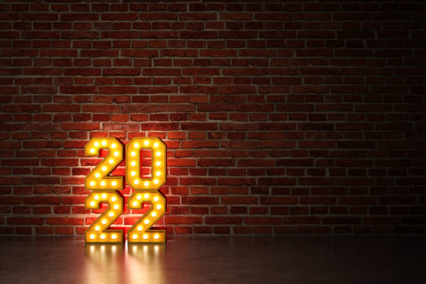 istock New Year 2022 Creative Design Concept with bulbs 1308182160