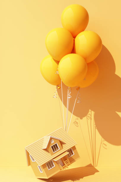 istock Yellow balloon Tied up with a yellow house and it's pulling it up 3d rendering 1308188244