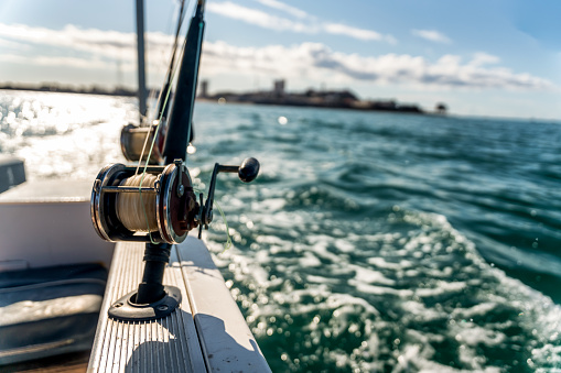 Fishing Reels On A Charter Fishing Boat Heading For A Reef To Go Deep Sea Fishing In The Sea Of Cortez, Puerto Penasco