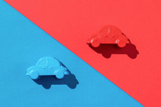 istock A blue and red car on a diagonal blue and red background. 1308193349