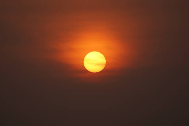 istock Sky on fire with sunrise giving orange color 1308197611