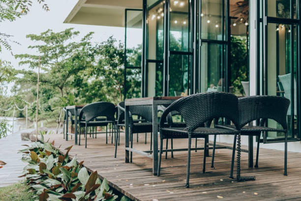 istock Empty tables and chairs on the riverside with outdoor. 1308197612