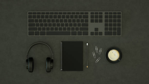 istock Top View of Workplace with Keyboard, Technology Idea Concept, Black Background 1308200124