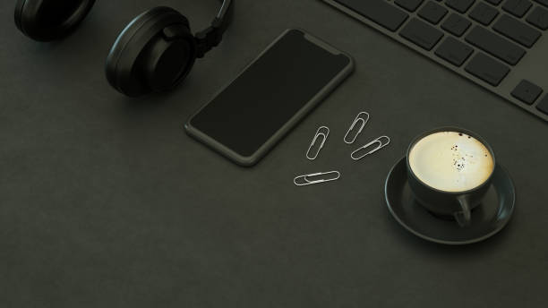 istock Top View of Workplace with Keyboard, Technology Idea Concept, Black Background 1308200201
