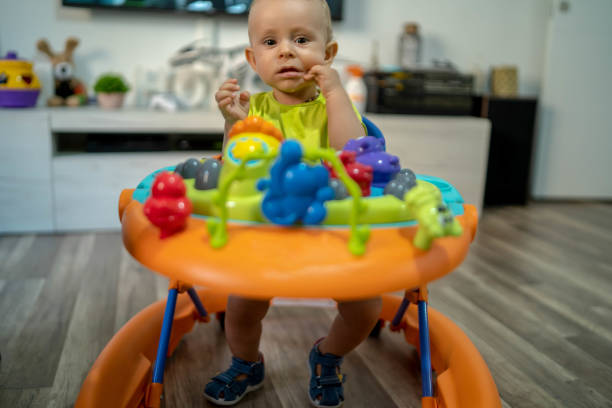 istock Baby in baby walker 1308206255