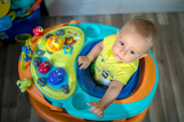 istock Baby in baby walker 1308206269