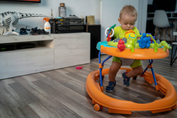 istock Baby in baby walker 1308206279