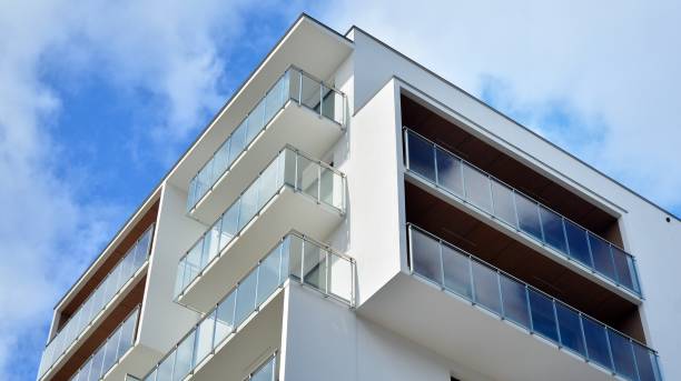 istock Futuristic square architecture of apartment building. 1308209774
