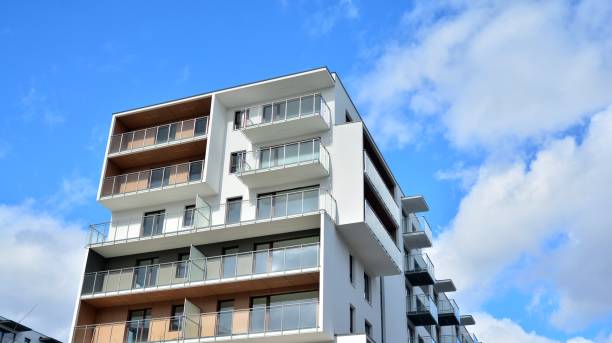istock Futuristic square architecture of apartment building. 1308209831