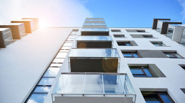 istock Futuristic square architecture of apartment building. 1308209910