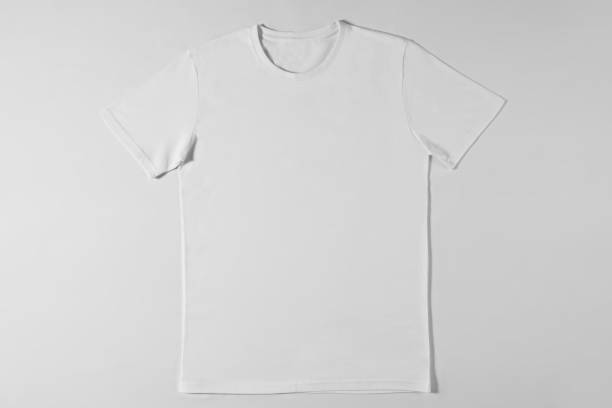 istock White t-shirt lying on light background 1308210122