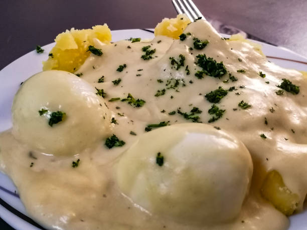 istock Mustard eggs with potatoes and sauce 1308210973