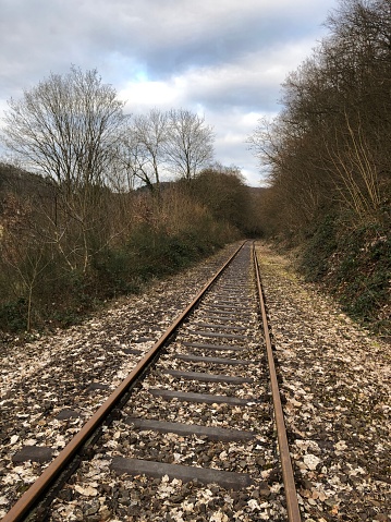 Railway tracks lead straight ahead
