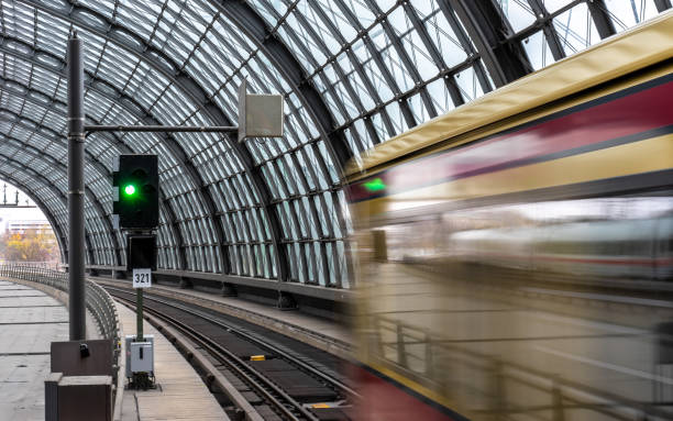 istock Blurred Motion Of Train At Railroad Station 1308214026