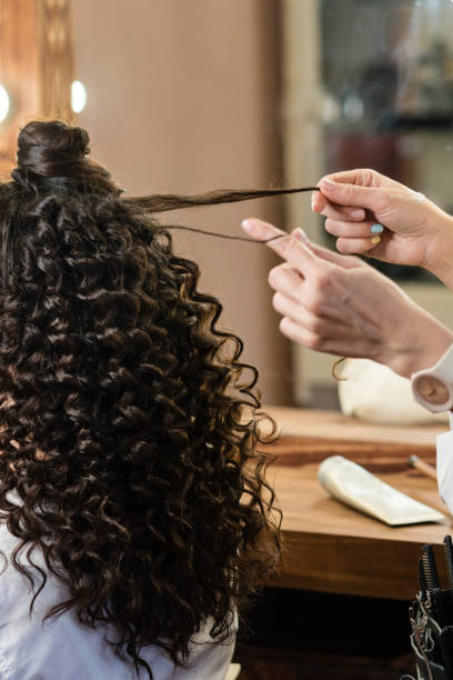 istock Hair styling process. Afro curls. Beauty industry 1308214786