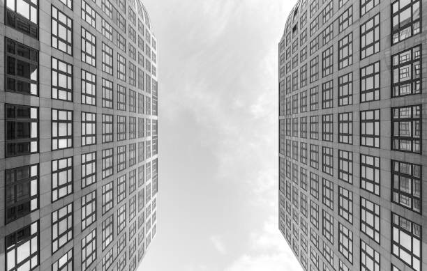 istock Low Angle View Of Modern Buildings Against Sky 1308216548