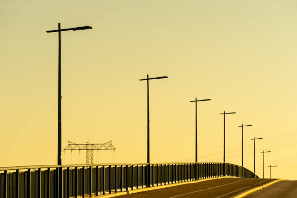 istock Low Angle View Of Street Lights Against Clear Sky 1308216842