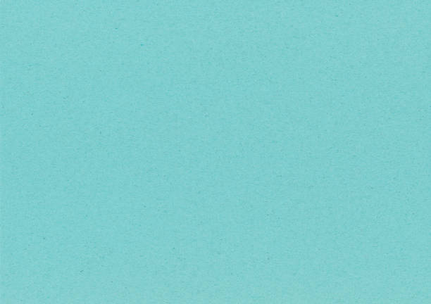 istock Turquoise Paper Background with Fibers 1308219639