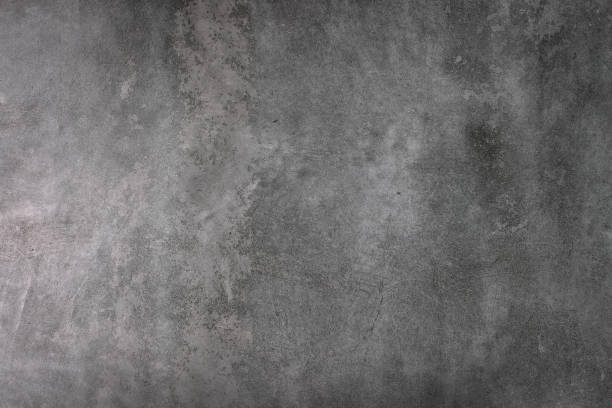 istock textured gray stucco wall background with scratches 1308220060