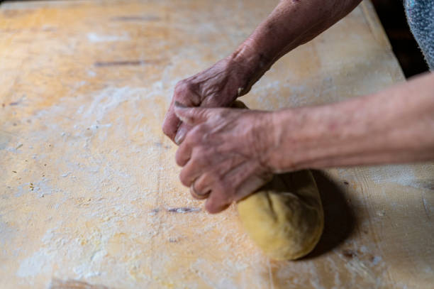 istock grandmother preparing homemade pasta 1308221809