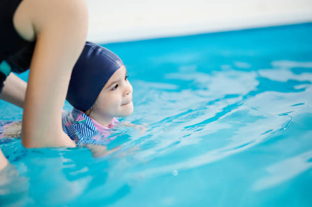 istock Teaching kids to swim theme 1308222950