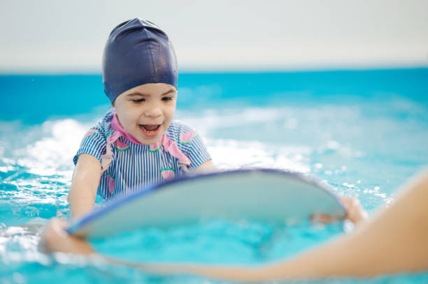 istock Swimming lessons for small kids theme 1308222978