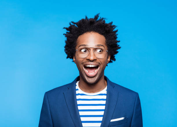 istock Portrait of excited man 1308223195