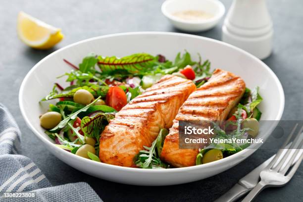 Grilled Salmon Fillet And Fresh Vegetable Salad Mediterranean Diet Stock Photo - Download Image Now