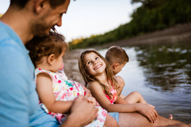 istock Family relaxation on the river 1308230062