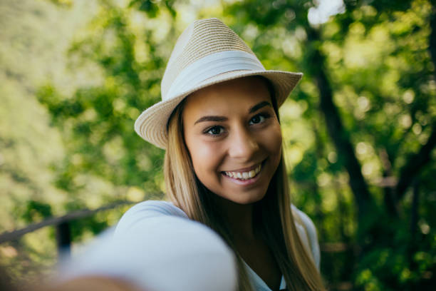 istock Happy woman hiking in mountains 1308232613