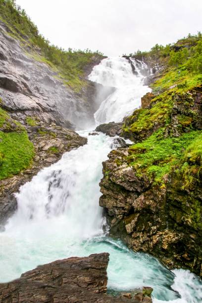 istock Kjosfossen Falls on Flam Railway 1308234391