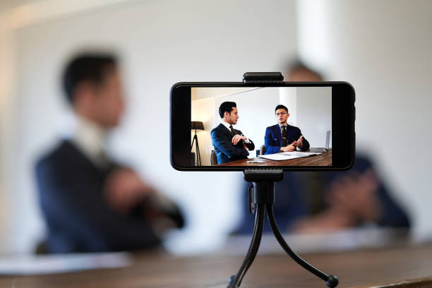 istock Business talk A businessman shooting a video 1308235802