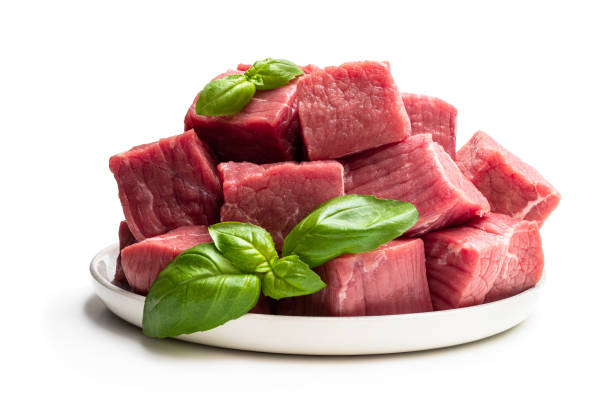 carne cruda fresca en plato cerámico aislado en blanco - veal meat raw steak fotografías e imágenes de stock