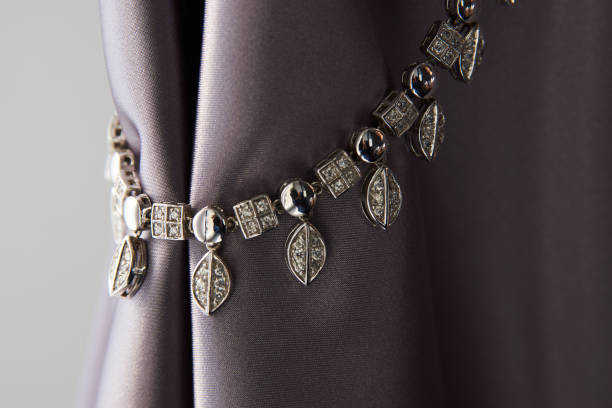 istock Elegant necklace with diamonds on grey background with copy space 1308236189