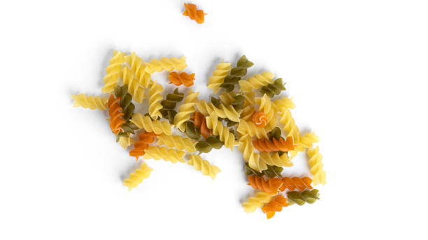 istock Colorful fusilli pasta isolated on a white background 1308239454