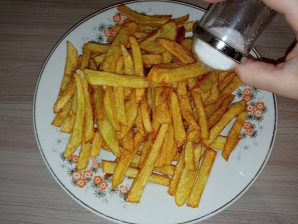 istock French fries with salt 1308239617