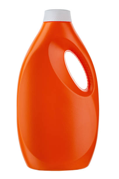 istock Orange plastic bottle for liquid laundry detergent, cleaning agent, bleach or fabric softener isolated on white background. 1308242110